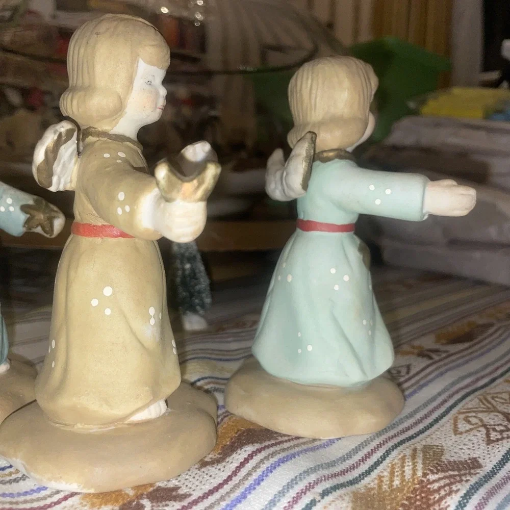 4 Distressed Young Angels In Different Poses And‎ Colors Of Dress, Very Sweet